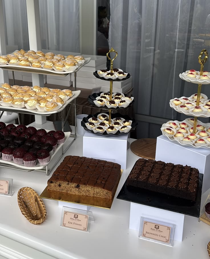 Styled Baba Bakes dessert spread with brownies and pastries