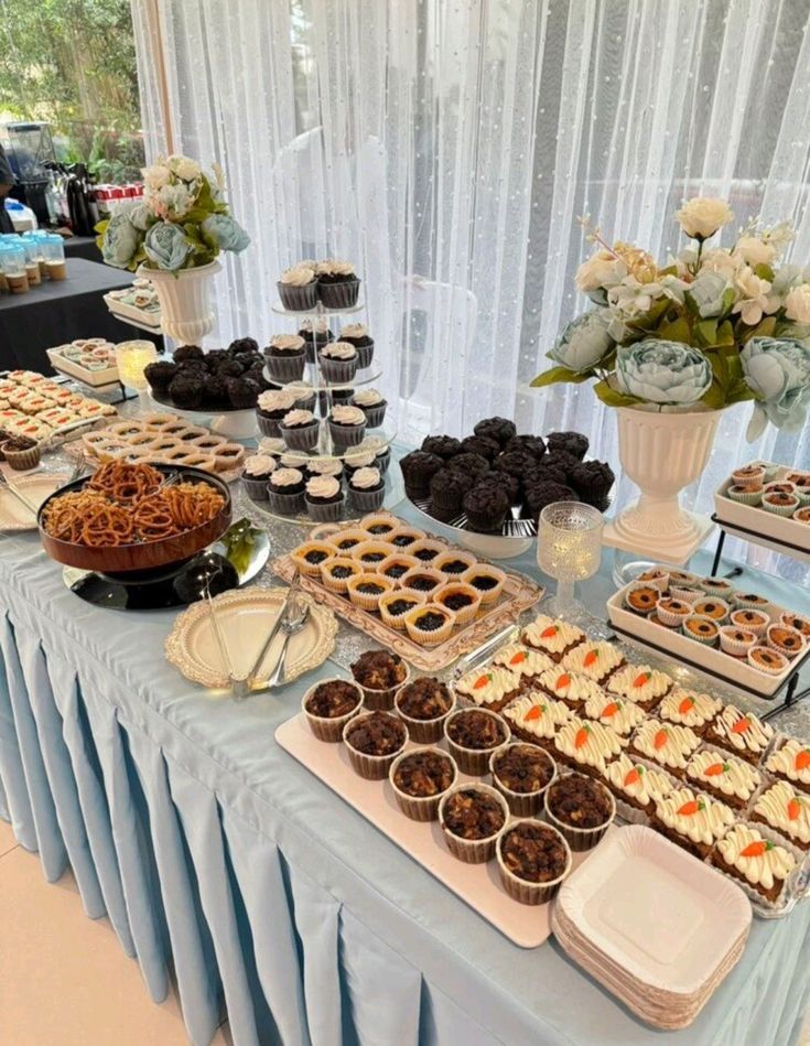 Elegant Baba Bakes dessert bar with assorted mini desserts